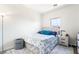 Comfortable bedroom with natural light, stylish furniture and a cozy atmosphere at 135 Manor House Ave, Las Vegas, NV 89123