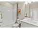 Clean bathroom with a bathtub, white subway tile, and modern vanity at 137 Harmonica Ave # Lot 19, Henderson, NV 89015