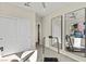 Bedroom with carpet, neutral walls, large mirrors, and closet with white sliding doors at 137 Harmonica Ave # Lot 19, Henderson, NV 89015