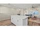 Bright open-concept living area with kitchen island, modern furnishings, and stylish decor at 137 Harmonica Ave # Lot 19, Henderson, NV 89015