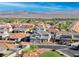 View of a two-story home in a neighborhood with mountain views at 1523 Great Sands St, Boulder City, NV 89005