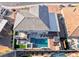 Aerial view of backyard showcasing a pool, spa, patio and manicured landscaping at 1523 Great Sands St, Boulder City, NV 89005