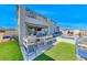 Private backyard oasis with sparkling pool, spa, and outdoor dining area with BBQ at 1523 Great Sands St, Boulder City, NV 89005