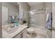 Neutral bathroom with a shower/tub combo and a white vanity at 1523 Great Sands St, Boulder City, NV 89005