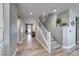 Inviting foyer with wood floors and a staircase at 1523 Great Sands St, Boulder City, NV 89005