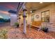 Cozy front porch featuring a bench and stylish decor at 1523 Great Sands St, Boulder City, NV 89005