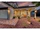 Inviting front porch with swing seating and decorative columns at 1523 Great Sands St, Boulder City, NV 89005