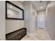 Inviting hallway features bench seating with storage and a large mirror at 1523 Great Sands St, Boulder City, NV 89005