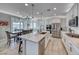 Bright kitchen boasts a large island, stainless steel appliances, and an adjacent dining area at 1523 Great Sands St, Boulder City, NV 89005