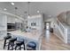 Modern kitchen featuring stainless steel appliances, a large island, and pendant lighting at 1523 Great Sands St, Boulder City, NV 89005