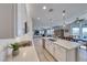 Open kitchen offers a spacious design, stainless appliances, and a view into the living area at 1523 Great Sands St, Boulder City, NV 89005