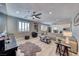 Bright and airy living room boasts sleek hardwood floors, stylish furnishings, and a cozy atmosphere at 1523 Great Sands St, Boulder City, NV 89005