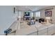 Spacious living room features a large sectional sofa, modern decor, and plenty of natural light at 1523 Great Sands St, Boulder City, NV 89005