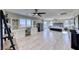 Spacious main bedroom with a desk area, stylish decor, and sliding glass doors at 1523 Great Sands St, Boulder City, NV 89005
