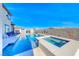 Beautiful pool and spa with custom tile and design, perfect for relaxation and entertainment at 1523 Great Sands St, Boulder City, NV 89005