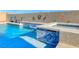 Luxurious pool and spa showcasing the tile work, stone coping, and water feature at 1523 Great Sands St, Boulder City, NV 89005