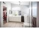 Clean and spacious bathroom with double vanity, walk-in shower, and separate bathtub at 1553 Bright View Dr, Las Vegas, NV 89119