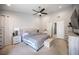 Serene main bedroom boasts neutral colors, plush carpeting, and ample natural light, creating a tranquil retreat for relaxation at 1553 Bright View Dr, Las Vegas, NV 89119