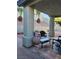 Covered patio featuring tiled flooring and decorative plants and garden decor around the perimeter at 1617 Stonefield St, Las Vegas, NV 89144