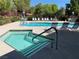 Community pool and hot tub, featuring steps and railings at 169 Pioneer Peak Pl, Las Vegas, NV 89138
