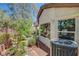 Exterior of home featuring the AC unit and side yard landscaping at 169 Pioneer Peak Pl, Las Vegas, NV 89138