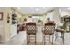 Bright eat-in kitchen with stainless steel appliances and tile flooring at 169 Pioneer Peak Pl, Las Vegas, NV 89138