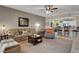 Spacious living room showcasing an open layout connecting to the kitchen and dining area at 169 Pioneer Peak Pl, Las Vegas, NV 89138