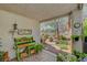 Outdoor patio with potting bench overlooks the lush, landscaped backyard at 169 Pioneer Peak Pl, Las Vegas, NV 89138