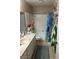 Cute decorated bathroom with a marble countertop and a combination tub and shower at 1866 Camino Verde Ln, Las Vegas, NV 89119