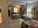 Cozy bedroom featuring a large mirrored closet, comfortable beds, and soft lighting at 1866 Camino Verde Ln, Las Vegas, NV 89119
