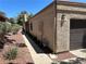 Exterior view of the home and the two-car garage at 1866 Camino Verde Ln, Las Vegas, NV 89119