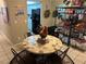 Eat-in kitchen featuring a decorative shelf and table at 1866 Camino Verde Ln, Las Vegas, NV 89119