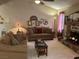 Cozy living room with stone fireplace at 1866 Camino Verde Ln, Las Vegas, NV 89119