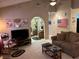 Spacious living room with arched doorway at 1866 Camino Verde Ln, Las Vegas, NV 89119