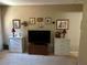 Comfortable living room with neutral walls, carpet flooring, and well decorated at 1866 Camino Verde Ln, Las Vegas, NV 89119
