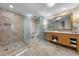 Open bathroom layout featuring a walk-in shower, toilet area, double sink vanity, and stylish design at 2000 N Fashion Show Dr # 5417, Las Vegas, NV 89109