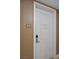 Elegant door with a modern handle and clear numbering on the side in a neutrally decorated hallway at 2000 N Fashion Show Dr # 5417, Las Vegas, NV 89109
