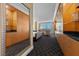 Hallway with a mirror showing the living area and storage at 2000 N Fashion Show Dr # 5417, Las Vegas, NV 89109