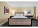 Comfortable bedroom featuring a king bed, neutral decor, and contemporary art at 2000 N Fashion Show Dr # 5617, Las Vegas, NV 89109