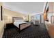 Bright bedroom with a comfortable king bed and seating area near the window at 2000 N Fashion Show Dr # 5617, Las Vegas, NV 89109