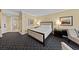 Open bedroom features a comfortable bed, a convenient bathroom, and a small workspace at 2000 N Fashion Show Dr # 5617, Las Vegas, NV 89109