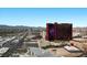 Expansive city view, including a casino and mountain range, under a bright blue sky at 2000 N Fashion Show Dr # 5617, Las Vegas, NV 89109