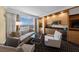 Open living room showcases city views, stylish seating, and a convenient kitchenette for modern living at 2000 N Fashion Show Dr # 5617, Las Vegas, NV 89109