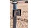 Close up of keypad entry to fenced property at 2031 Silver St, Pahrump, NV 89048