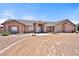 Expansive home features a desert landscape, charming facade, and circular drive at 2031 Silver St, Pahrump, NV 89048
