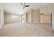 Large main bedroom featuring a vaulted ceiling, a ceiling fan, and sliding glass door access to the exterior at 2031 Silver St, Pahrump, NV 89048