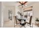 Bright dining room with a modern table, chairs, and natural light, perfect for gatherings at 2050 W Warm Springs Rd # 3624, Henderson, NV 89014