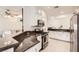 Modern kitchen with stainless steel appliances, granite counters, and open layout at 2050 W Warm Springs Rd # 3624, Henderson, NV 89014