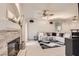 Inviting living room with stone fireplace and neutral decor creating a warm atmosphere at 2050 W Warm Springs Rd # 3624, Henderson, NV 89014