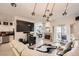 Bright and open living room with a modern fireplace, neutral tones, and a sliding glass door to the patio at 2050 W Warm Springs Rd # 3624, Henderson, NV 89014